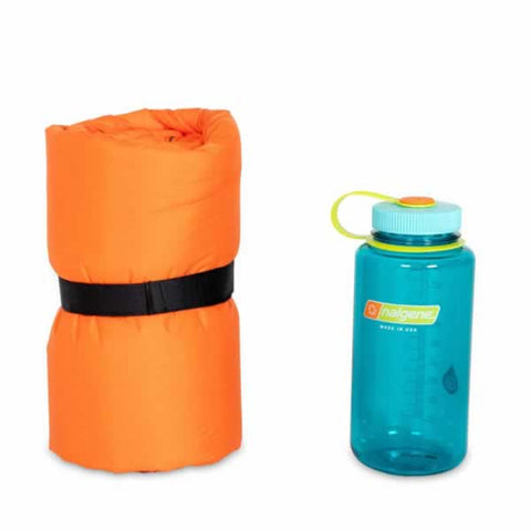 Nemo Flyer Self Inflating Hike Camp Mattress Pad packed down next to water bottle