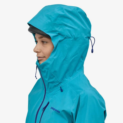 Patagonia Women's Calcite Jacket Gore-Tex Paclite Waterproof Breathable hood in use side view