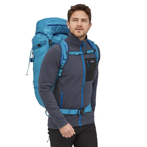 Patagonia Ascensionist climbing mountaineering pack 55 litres in use joya blue front view