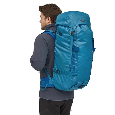 Patagonia Ascensionist climbing mountaineering pack 55 litres in use joya blue