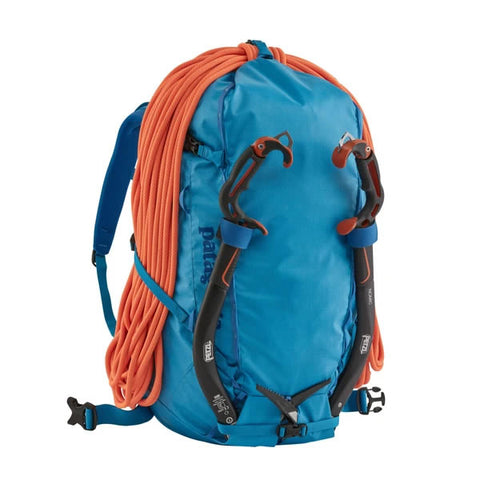 Patagonia Ascensionist climbing mountaineering pack 55 litres in use joya blue attachments for rope and tools