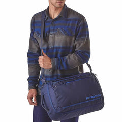 Patagonia Tres 25 Litre Daypack with Shoulder Strap in use