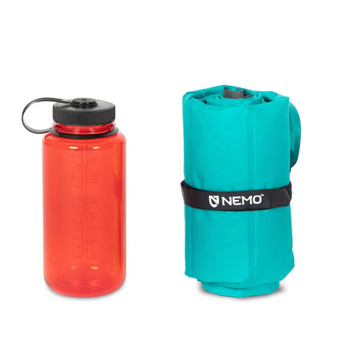 Nemo Astro Inflatable Insulated Sleeping Mat Regular packed next to water bottle