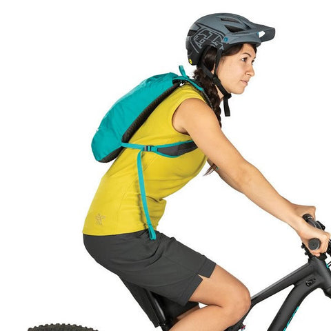 Osprey Kitsuma 1.5 Litre Women's Hydration MTB Backpack in use on bike