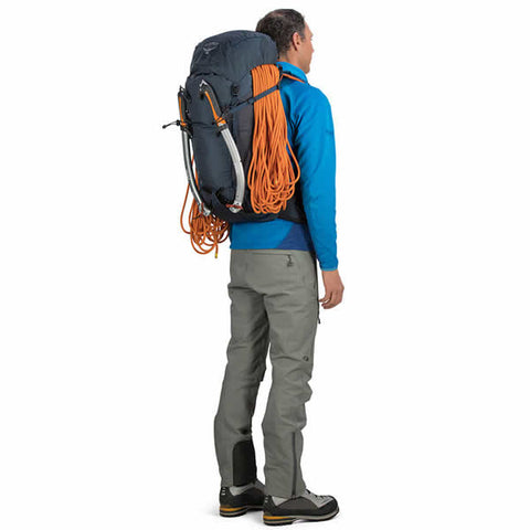 Osprey Mutant 38 litre climbing mountaineering backpack blue fire in use rear view